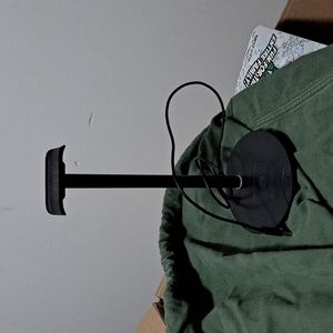 The wireless charger has the charger with it, no box.